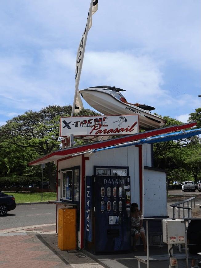 Xtreme Parasail check-in booth with a jet ski on top